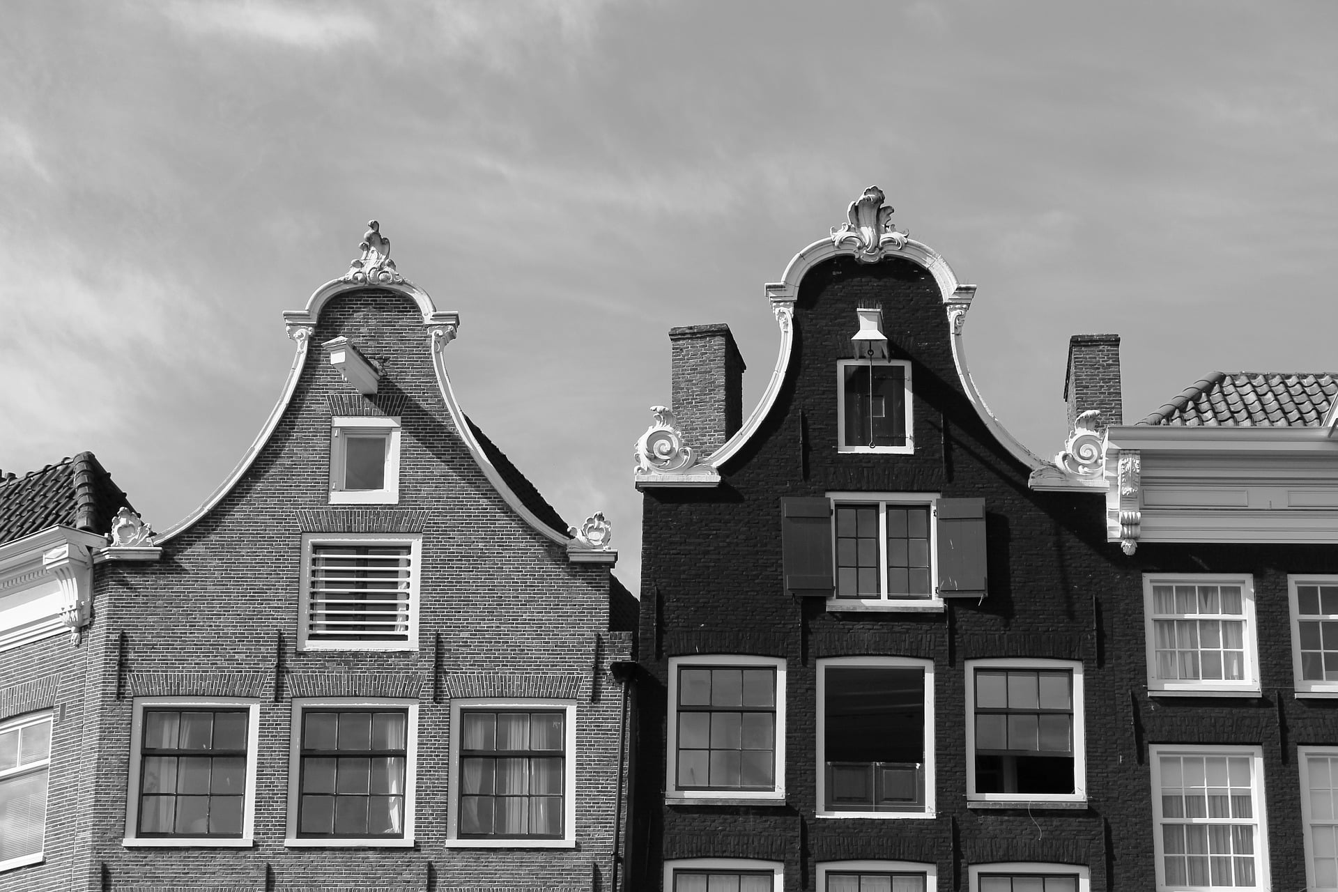 Black-and-white Amsterdam canal house gables